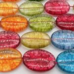 CRISTAL MULTICOLOR ALARGADO 25 X 18 A 30 X15MM