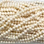 PERLA REDONDA CON RALLAS  6-7 MM