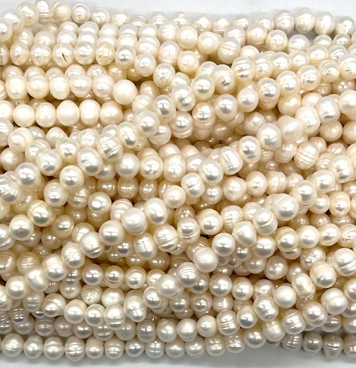 329386 PERLA REDONDA CON RALLAS 6-7 MM - Imagen 1