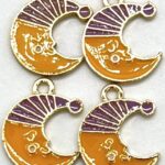 DIJE ZINC  LUNA MORADA Y AMARILLA
