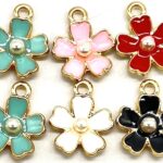 DIJE ZINC  FLOR PERLA