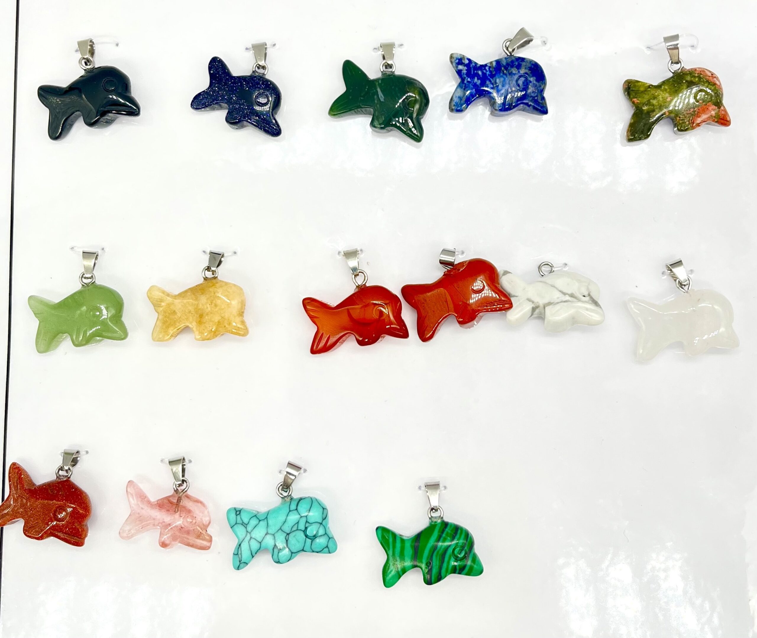 202367 DIJES DE PIEDRA NATURALES SILUETA DELFIN 25MM X 15MM - Imagen 1